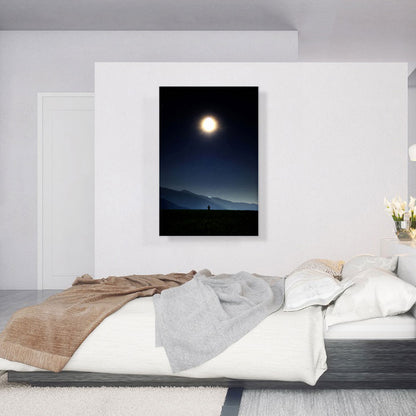 Man Standing Looking at Bright Moon in the Night