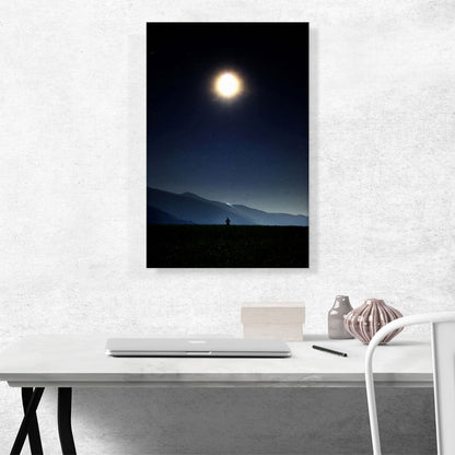 Man Standing Looking at Bright Moon in the Night